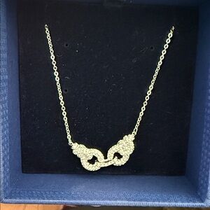 Brand-new inbox with tag never been worn before 
Swarovski Silver Necklace